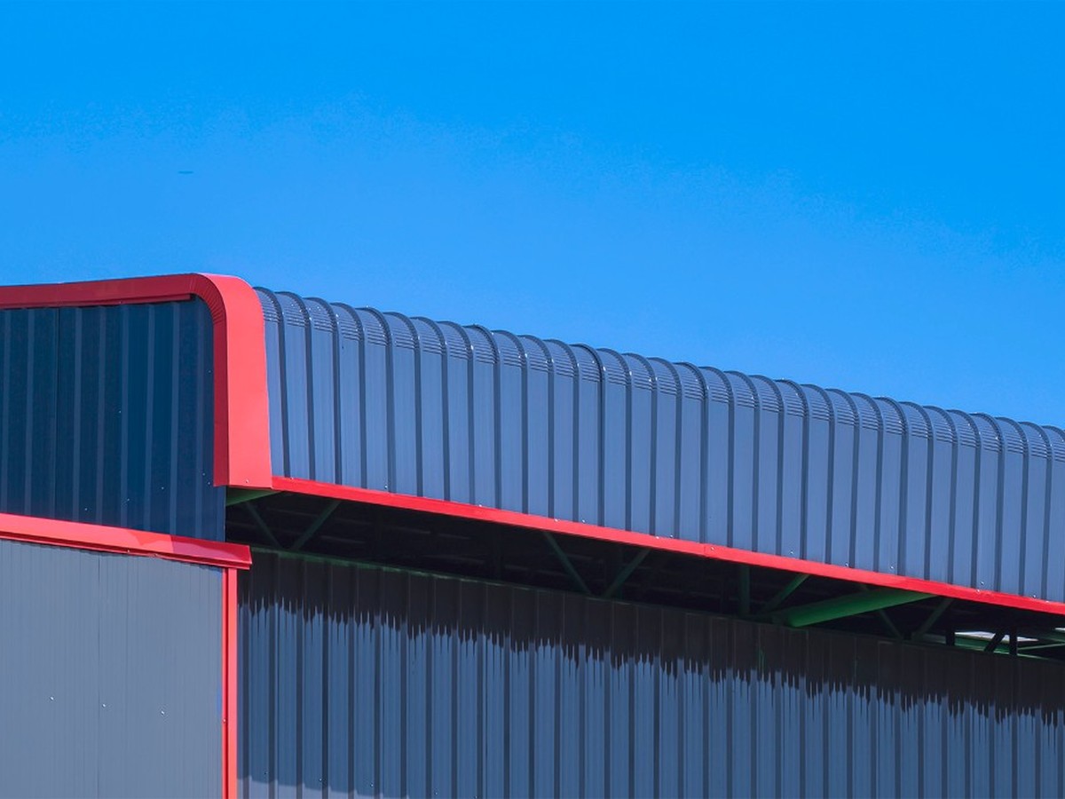 Colour coated sheet crimping on industrial roof